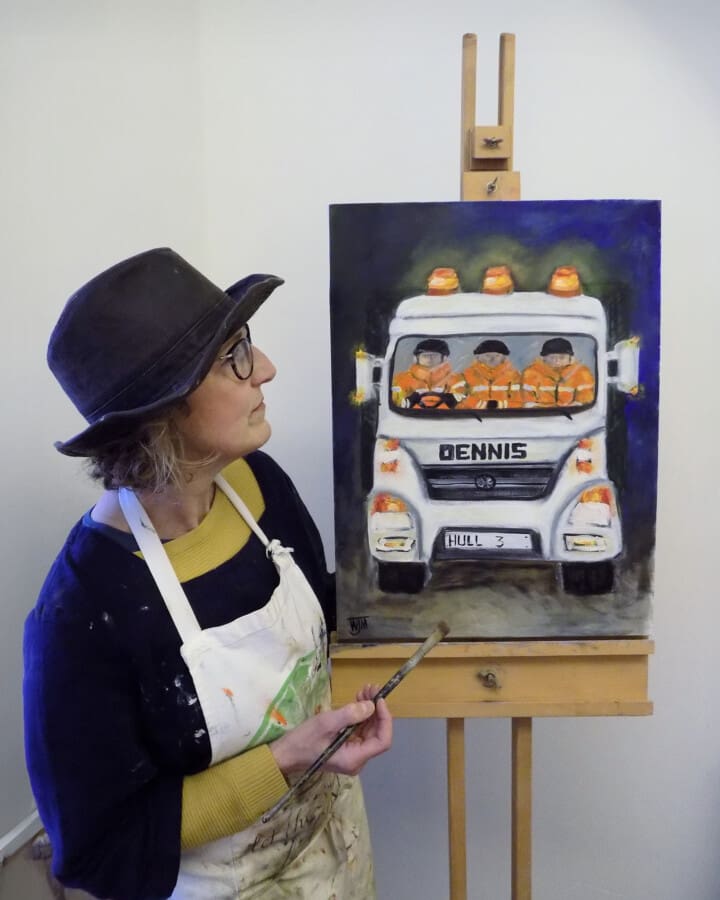 East Yorkshire based artist Wendy Medlam painting at her easel
